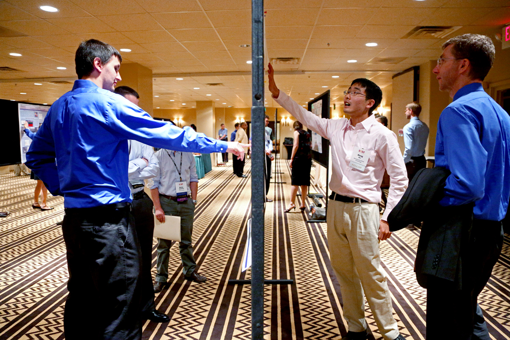 Fellows practice presenting their research to a non-expert audience during an annual poster session and contest.